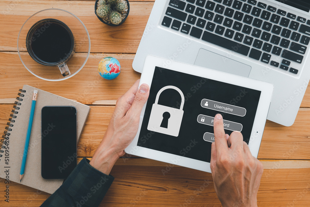 Poster person hand using digital tablet with login and password on screen display, cyber security concept, 