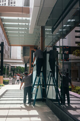 workers ladder laborers miami people 