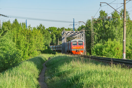 Passenger traim moves through the bridge.
