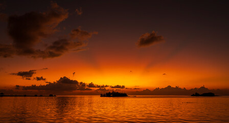 Fototapeta na wymiar Sunset on Maldives paradise island holiday resort
