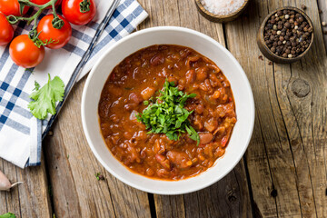 bean lobio in a bowl top view on wooden table