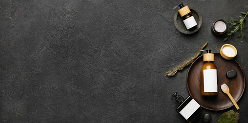 Set of natural cosmetics on dark background with space for text