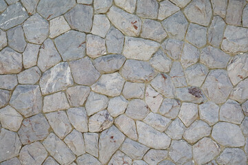 Texture of a stone wall. Stone wall as a background or texture. Part of a stone wall, for...