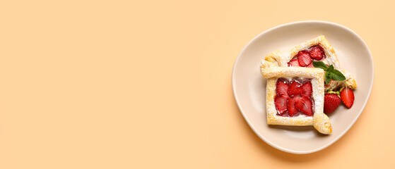 Plate with sweet strawberry puff pastries on beige background with space for text - obrazy, fototapety, plakaty