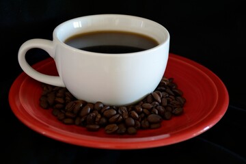Fototapeta premium coffee cup, beans on a saucer