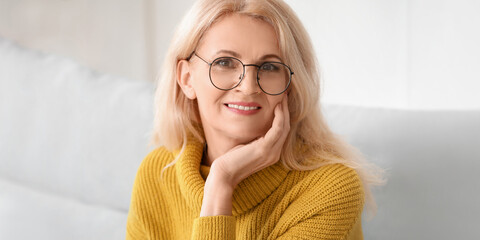 Happy mature woman at home. Concept of ageing and menopause