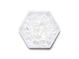 Sodium Thiosulfate in hexagonal molecular shaped container on white background. Top View