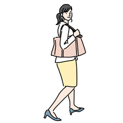 Fototapeta na wymiar カバンを持って歩いている若いビジネス女性