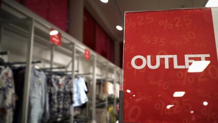 Red Outlet Sale Sign Sticker in mall store