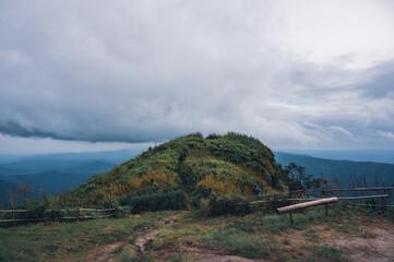 Camp site and walkway for go to the Pha Hua Sing on cloudy days, Viewpoint Pha Hua Sing at Phu Thap Berk in Thailand.