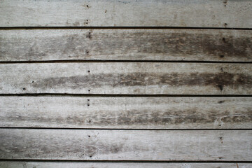 Fototapeta na wymiar Old wooden background with horizontal motif.
