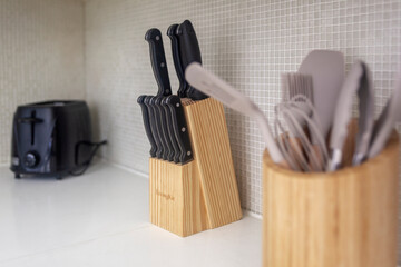 Knife set on counter with wood block