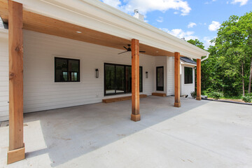 Brand new construction farmhouse style white home exterior