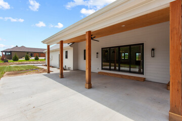 Brand new construction farmhouse style white home exterior