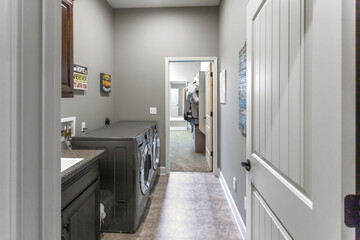 brand new laundry room with new appliances
