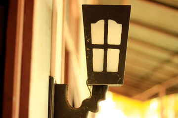 old lamp on the wall of the house