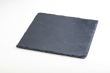 Black stone board isolated on white