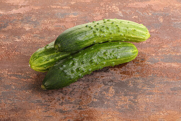 Fersh juicy green cucumbers heap