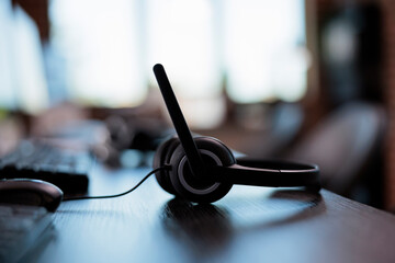 Call center equipment to chat with clients on telephone helpline at helpdesk. Customer service...