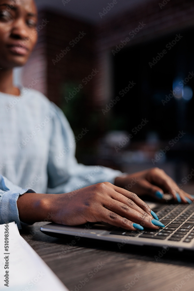 Aufkleber close up shot of african american forex stock professional trader at desk, using laptop to analyze f