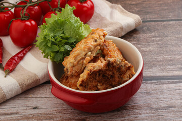 Fried salmonn cutlet in the bowl