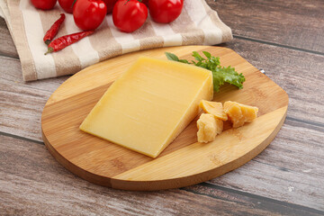Parmesan hard cheese with small pieces