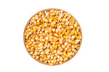 dry corn in plate isolated on white background.Unpopped popcorn