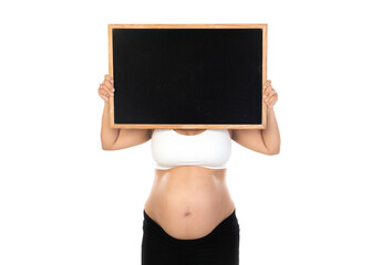 Beautiful pregnant girl holding white empty blackboard