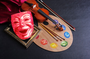 Art attributes. Painting, music, theater. Art palette and brushes, violin and comedy theatrical...