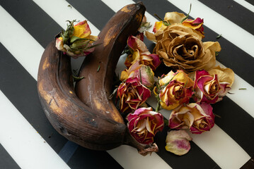 dried roses and overripe bananas