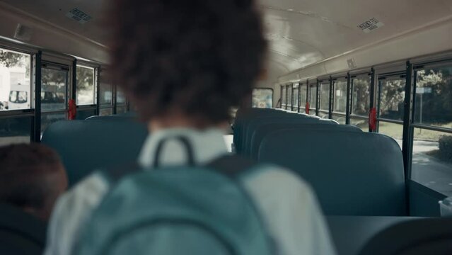 Teen school children boarding on empty shuttle. Pupils taking seats in transport