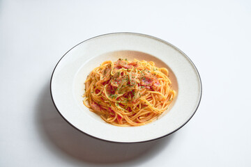ベーコンと舞茸のガーリックトマトパスタ