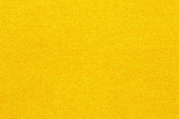 Yellow golden fabric cloth texture background, seamless pattern of natural textile.