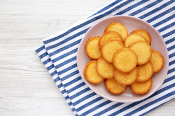 Homemade Pure Butter Shortbreads on a Pink Plate, top view. Flat lay, overhead, from above. Copy space.