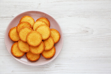 Homemade Pure Butter Shortbreads on a Pink Plate, top view. Flat lay, overhead, from above. Space for text.