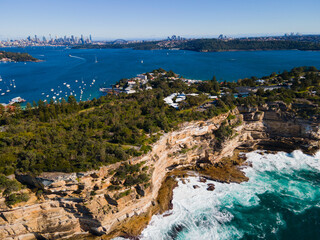 Aerial drone view of Watsons Bay in East Sydney, Australia along the coastal clifftop with Sydney...