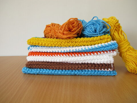 Reusable crocheted and knitted dishcloths from wool scraps
