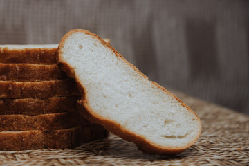pieces of white bread on the table close up