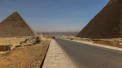 Popular tourist destination ancient Egyptian Giza city ruins of the pyramids of Gizeh close to...