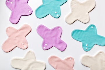 Eco-friendly reusable fabric women's pads. set of colorful bright reusable menstrual pads. zero waste woman periods concept top view with copy space