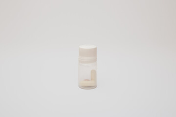 Pills with the badas, dietary supplement on a white background