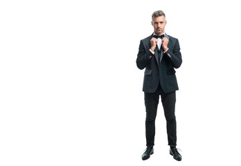 confident elegant man waiter with bowtie isolated on white background. full length