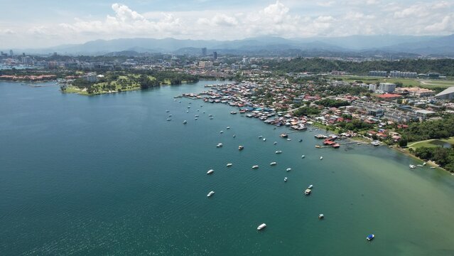 Kota Kinabalu, Sabah Malaysia &ndash; June 15, 2022: The Tanjung Aru Beach, Fisherman Village and Shangri-La Hotel