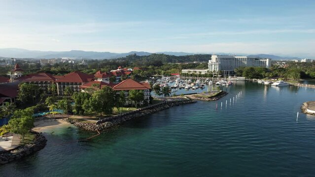 Kota Kinabalu, Sabah Malaysia &ndash; June 15, 2022: The Tanjung Aru Beach, Fisherman Village and Shangri-La Hotel