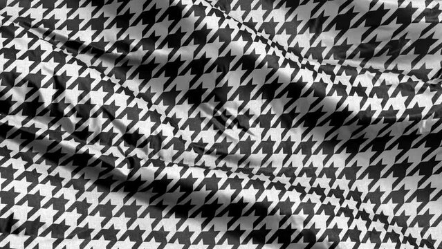 Monochrome black & white seamless houndstooth pattern textile fabric waving on the wind background. Traditional arab texture. Full filling seamless loop.