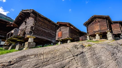 Fotobehang Wooden beam houses in Saas Fee, Switzerland.  © Ondrej Bucek