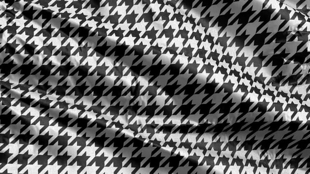 Monochrome black & white seamless houndstooth pattern textile fabric slow waving on the wind background. Traditional arab texture. Full filling slow motion seamless loop.