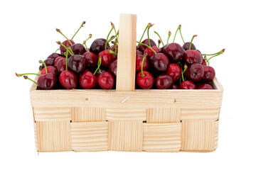 cherries in wooden basket frontal side view