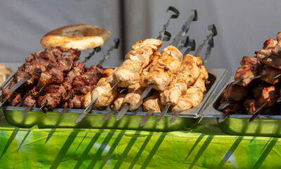 Meat on skewers grilled on coals.