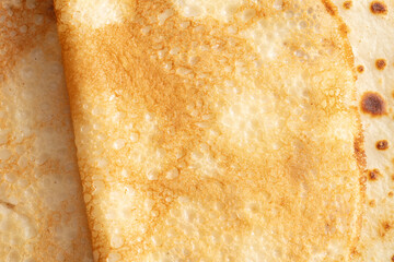 Pan fried pancake as a background.